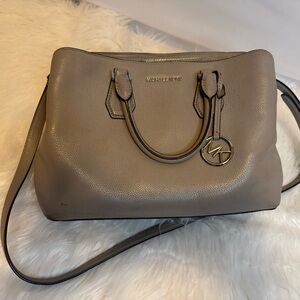 Micheal Kors tan bag, 3 sections, some light wear
